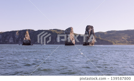 Three Brothers sea stacks in Avacha Bay near Petropavlovsk-Kamchatsky, Russia Three Brothers sea stacks in Avacha Bay near Petropavlovsk-Kamchatsky, Russia 139587800