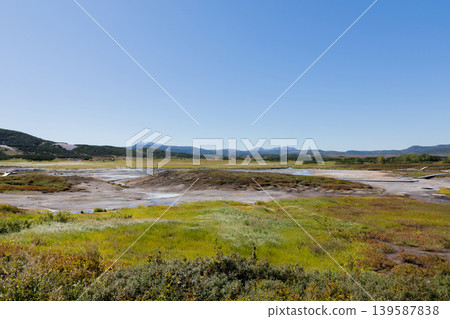 Uzon Volcano caldera landscape with geothermal fields and tundra, Kamchatka Uzon Volcano caldera landscape with geothermal fields and tundra, Kamchatka 139587838