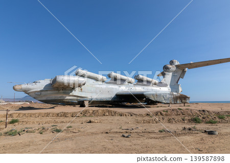 Abandoned Soviet ekranoplan aircraft on the Caspian Sea coast near Derbent Abandoned Soviet ekranoplan aircraft on the Caspian Sea coast near Derbent 139587898
