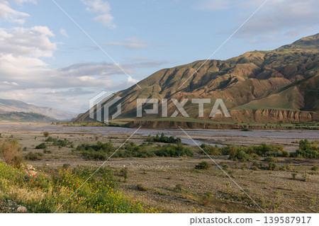 Kavalar mountain valley landscape with riverbed and dramatic Caucasus hills 139587917