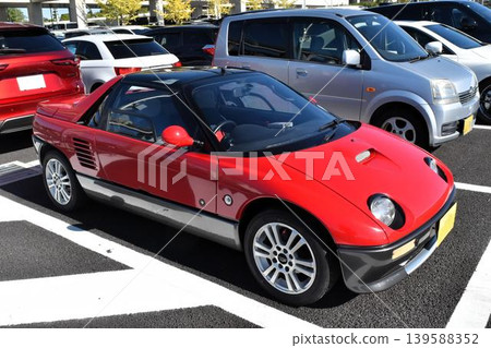 Passenger cars lining up in the parking lot 139588352