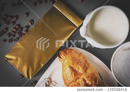 Top view of coffee and croissant with coffee bean Top view of coffee and croissant with coffee bean 139588418