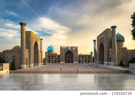 Sunrise over Registan Square in Samarkand, Uzbekistan: Beautiful sunrise and Islamic architecture. (English: Sunr) Sunrise over Registan Square in Samarkand, Uzbekistan: Beautiful sunrise and Islamic architecture. (English: Sunr) 139588739