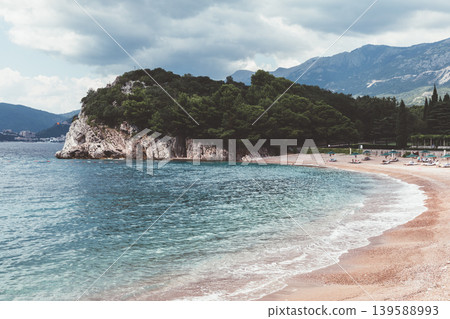 Scenic beach near Sveti Stefan with turquoise Adriatic sea and mountains Scenic beach near Sveti Stefan with turquoise Adriatic sea and mountains 139588993
