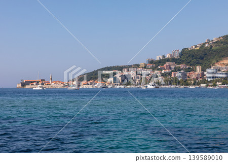 Coastal panorama of Budva old town and marina on the Adriatic Sea, Montenegro Coastal panorama of Budva old town and marina on the Adriatic Sea, Montenegro 139589010