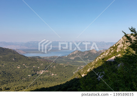 Panoramic view of Virpazar and Lake Skadar from mountain viewpoint in Montenegro 139589035