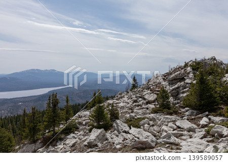 Zuratkul National Park mountain ridge with rocky slope and lake view in Russia Zuratkul National Park mountain ridge with rocky slope and lake view in Russia 139589057