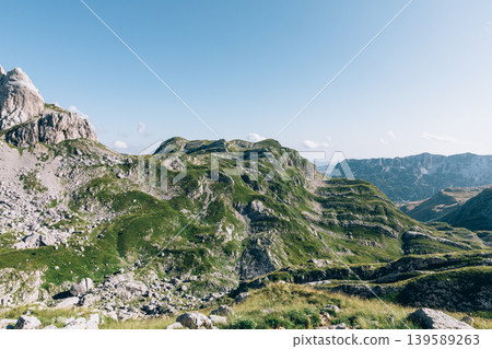 Bobotov Kuk peak and rugged alpine landscape in Durmitor National Park, Montenegro Bobotov Kuk peak and rugged alpine landscape in Durmitor National Park, Montenegro 139589263
