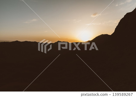 Sunrise over Durmitor National Park mountain silhouettes and golden sky, Montenegro Sunrise over Durmitor National Park mountain silhouettes and golden sky, Montenegro 139589267