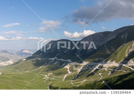 Mountain road switchbacks and green valley landscape in Dagestan, Caucasus 139589464