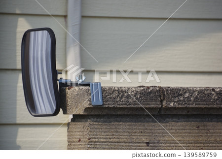 The appearance of the mirror attached to the stone wall The appearance of the mirror attached to the stone wall 139589759