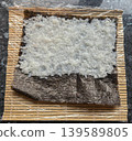 Sushi Rice on Nori Seaweed Sheet 139589805