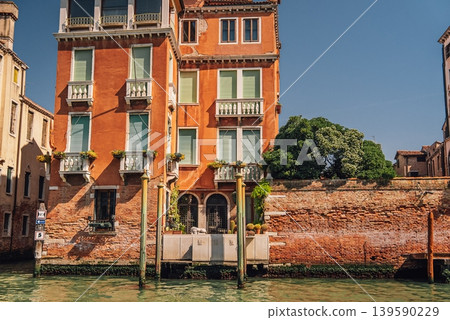 Classic Venice Grand canal houses viewed from vaporetto boat - waterbus. Italy. Classic Venice Grand canal houses viewed from vaporetto boat - waterbus. Italy. 139590229