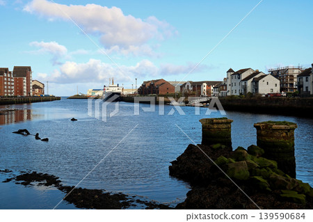 Passenger ferry and yachts moored at the mouth of the River Ayr in South West Scotland Passenger ferry and yachts moored at the mouth of the River Ayr in South West Scotland 139590684