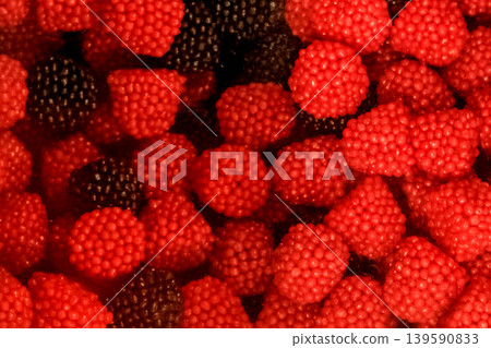 Red black color sweet sugar chewing raspberries blackberries gummy candy background food Red black color sweet sugar chewing raspberries blackberries gummy candy background food 139590833