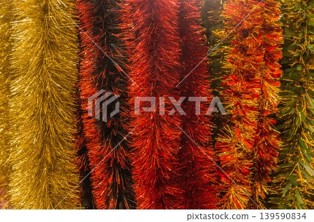Christmas bright colored tinsel decor christmas background decorations colorful vibrant festive object 139590834