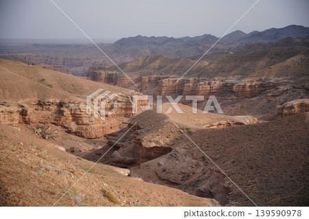 Charyn Canyon in Kazakhstan with Rocky Landscape and Clear Sky Charyn Canyon in Kazakhstan with Rocky Landscape and Clear Sky 139590978