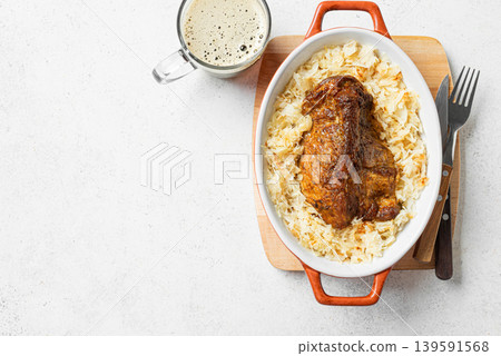 Slow Cooking German Pork and Sauerkraut Slow Cooking German Pork and Sauerkraut 139591568