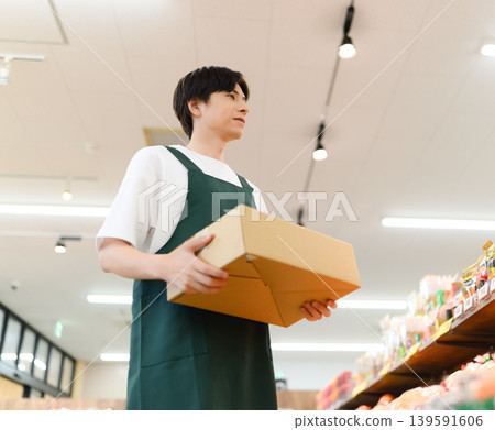 A man carries the goods. A man carries the goods. 139591606