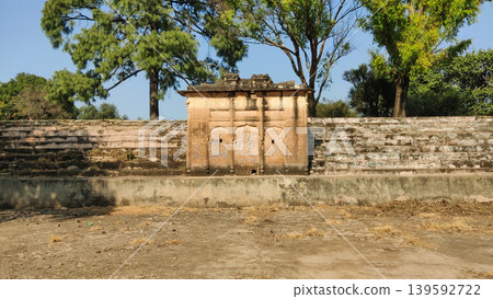 Ancient stone chamber beside dry pond at Tilla Jogian Pakistan Ancient stone chamber beside dry pond at Tilla Jogian Pakistan 139592722