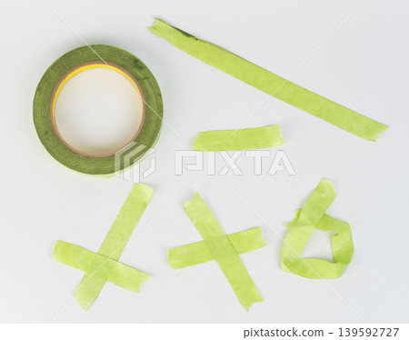 Sticky green paper cross pieces 139592727