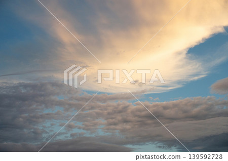 Golden hour sky with grey clouds Golden hour sky with grey clouds 139592728