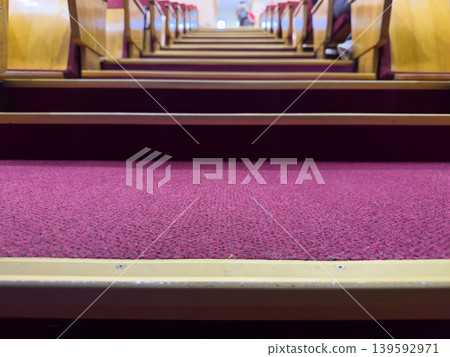 A view of the stairs in the theater auditorium, empty seats before the performance 139592971
