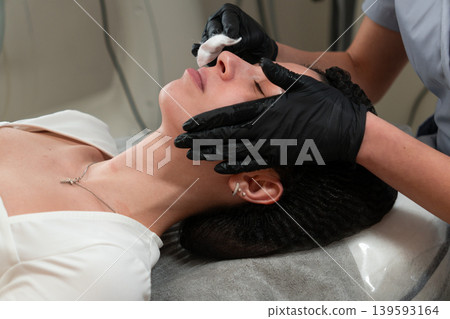 Facial Cleansing Before Peeling Procedure Close Up Facial Cleansing Before Peeling Procedure Close Up 139593164
