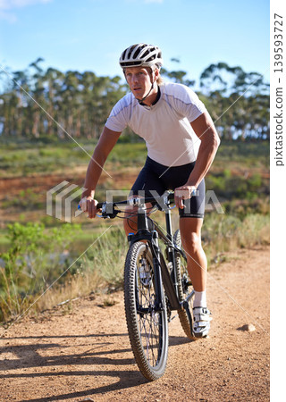 Man, cycling and exercise on bike in nature for journey and adventure in countryside. Athlete, workout and person riding on bicycle for cardio and fitness on dirt road, trail or path in the woods Man, cycling and exercise on bike in nature for journey and adventure in countryside. Athlete, workout and person riding on bicycle for cardio and fitness on dirt road, trail or path in the woods 139593727
