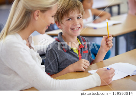 Teacher, child portrait and classroom for learning, education and writing or language development with support. Happy woman teaching, helping and face of student with knowledge or questions at school Teacher, child portrait and classroom for learning, education and writing or language development with support. Happy woman teaching, helping and face of student with knowledge or questions at school 139593814