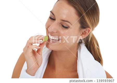 Wellness, grape and young woman in a studio for weight loss fitness exercise or healthy diet. Sports, self care and female person eating fruit for diet food nutrition isolated by white background. Wellness, grape and young woman in a studio for weight loss fitness exercise or healthy diet. Sports, self care and female person eating fruit for diet food nutrition isolated by white background. 139593907