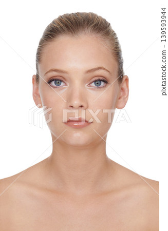 Woman, portrait or beauty with cosmetics in studio for glowing face, wellness and dermatology or serious. Model, person or confidence with skincare, collagen or makeup on white background and topless Woman, portrait or beauty with cosmetics in studio for glowing face, wellness and dermatology or serious. Model, person or confidence with skincare, collagen or makeup on white background and topless 139593944