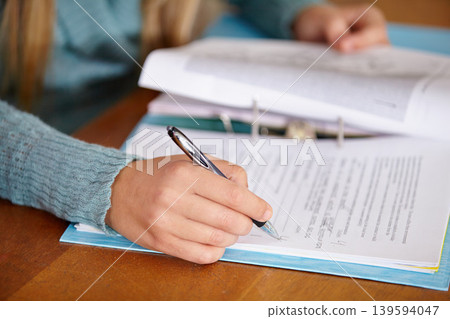 Hands, teacher and marking a test with education, review and feedback in a classroom, learning and study. Person, educator or woman with pen, checking exams or writing with results, closeup or school Hands, teacher and marking a test with education, review and feedback in a classroom, learning and study. Person, educator or woman with pen, checking exams or writing with results, closeup or school 139594047