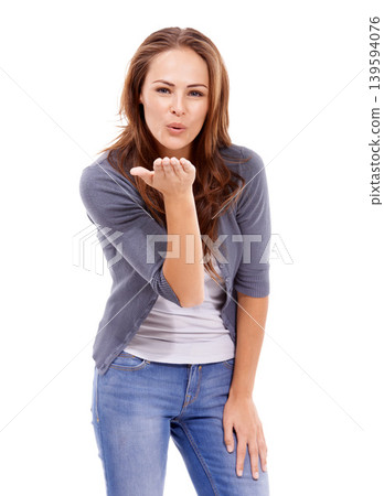 Portrait, happy woman and blow kiss in studio for love, care and romance with flirting sign isolated on white background. Young model with hand gesture for emoji, reaction and date on valentines day Portrait, happy woman and blow kiss in studio for love, care and romance with flirting sign isolated on white background. Young model with hand gesture for emoji, reaction and date on valentines day 139594076