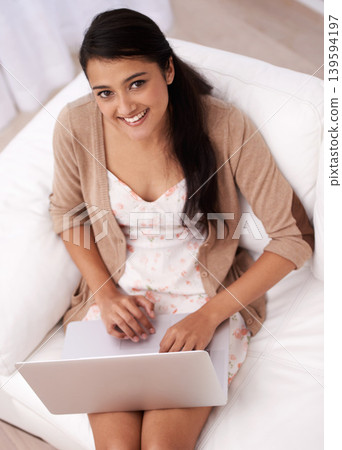 Portrait of girl on couch with laptop, smile and relax with remote work, website and browse from above. Happy woman on sofa with computer for freelance job, online web research and internet in home. Portrait of girl on couch with laptop, smile and relax with remote work, website and browse from above. Happy woman on sofa with computer for freelance job, online web research and internet in home. 139594197