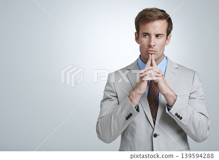 Business man, thinking and planning in studio, brainstorming and problem solving by white background. Male person, professional and mockup for ideas, contemplating solution and decision or choice Business man, thinking and planning in studio, brainstorming and problem solving by white background. Male person, professional and mockup for ideas, contemplating solution and decision or choice 139594288