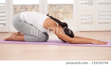 Woman, body and yoga for exercise and health with yogi on floor for workout at home, flexibility and calm with healing. Fitness, wellness and holistic, self care and physical wellbeing for zen Woman, body and yoga for exercise and health with yogi on floor for workout at home, flexibility and calm with healing. Fitness, wellness and holistic, self care and physical wellbeing for zen 139594794