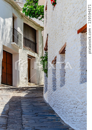 Typical street of an Andalusian village Capileira. 139594871