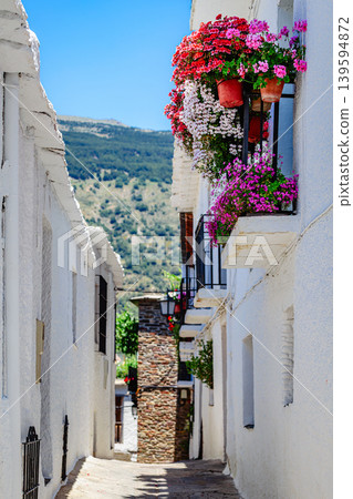 Typical street of an Andalusian village Capileira. 139594872