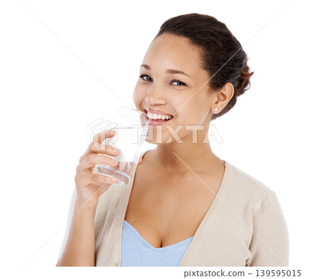 Portrait, woman and drinking water in studio for healthy nutrition, diet and detox on white background. Happy model with refreshing glass of liquid, aqua and h2o for benefits, hydration and vitamins Portrait, woman and drinking water in studio for healthy nutrition, diet and detox on white background. Happy model with refreshing glass of liquid, aqua and h2o for benefits, hydration and vitamins 139595015