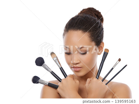 Woman, beauty and makeup brushes for cosmetics in studio, choice and decision for powder. Female model person, tools and equipment for application, skincare and facial treatment by white background Woman, beauty and makeup brushes for cosmetics in studio, choice and decision for powder. Female model person, tools and equipment for application, skincare and facial treatment by white background 139595163