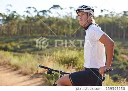 Man, cyclist and thinking on mountain bicycle, training and energy for rider, cycling and sport. Outdoor, hobby and fitness in nature, trail and active for wellness, helmet and physical workout Man, cyclist and thinking on mountain bicycle, training and energy for rider, cycling and sport. Outdoor, hobby and fitness in nature, trail and active for wellness, helmet and physical workout 139595250