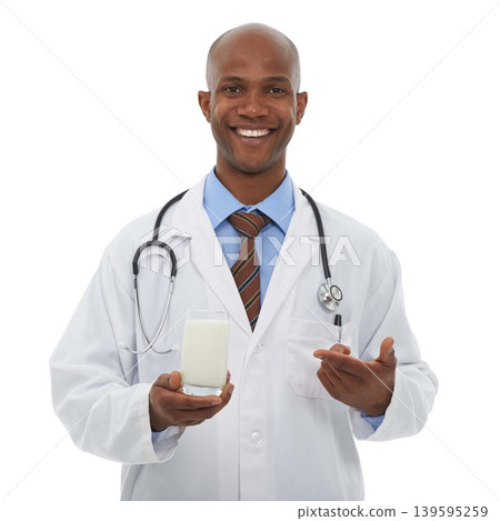 Portrait, black man and happy doctor point at milk for healthy bones, studio nutrition or calcium benefits. Beverage glass, hydration drink or African dietician with dairy product on white background Portrait, black man and happy doctor point at milk for healthy bones, studio nutrition or calcium benefits. Beverage glass, hydration drink or African dietician with dairy product on white background 139595259