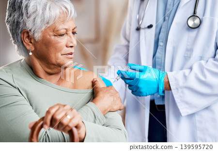 Doctor, vaccine and elderly woman in home for safety, virus prevention or medical wellness with cane. Healthcare worker, senior person and injection for immunity, disease protection or medicine Doctor, vaccine and elderly woman in home for safety, virus prevention or medical wellness with cane. Healthcare worker, senior person and injection for immunity, disease protection or medicine 139595720