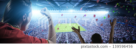 Soccer fans in the stadium Soccer fans in the stadium 139596456