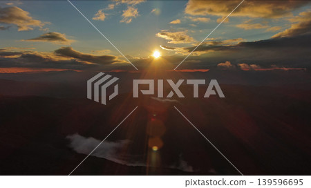 Amazing rocky mountains and sun at sunset 139596695