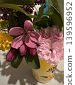 Pink and yellow spring flowers in a bouquet 139596952