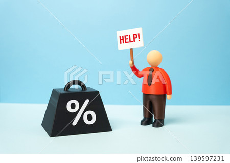 A businessman asks for help with his crushing debts. Financial crisis, bankruptcy risk and pressure from loans, creditors and business obligations. 139597231