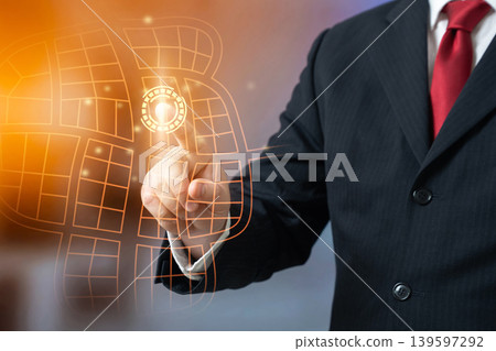 A businessman selects a location on a map to open a business. Business expansion and opening new points of presence. Market analysis and regional growth strategy. A businessman selects a location on a map to open a business. Business expansion and opening new points of presence. Market analysis and regional growth strategy. 139597292