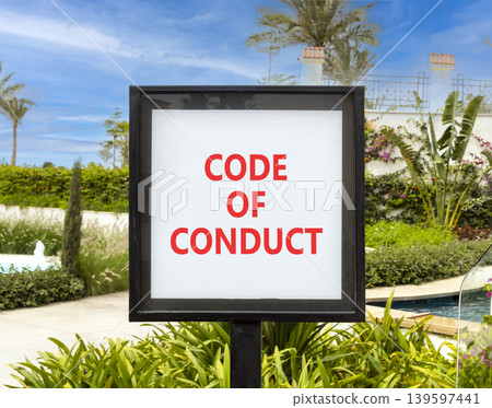 Code of conduct words symbol. Concept words Code of conduct on beautiful white sign. Beautiful hotel garden blue sky background. Business Code of conduct concept. Copy space. Code of conduct words symbol. Concept words Code of conduct on beautiful white sign. Beautiful hotel garden blue sky background. Business Code of conduct concept. Copy space. 139597441